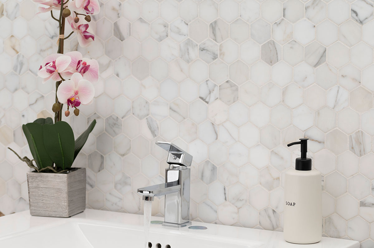 Calacatta Gold Marble Hexagon Mosaic Backsplash Tile in Bathroom Room Scene