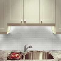 MSI 1-Handle Pull-Out Sprayer Kitchen Faucet — surface detail in natural tonality