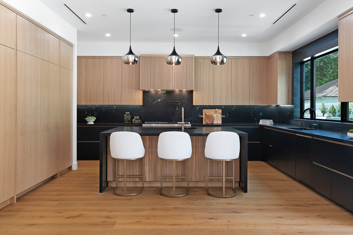 Room scene with Garrison Beverly Hills Canon wide-plank engineered hardwood flooring in a light oak tone