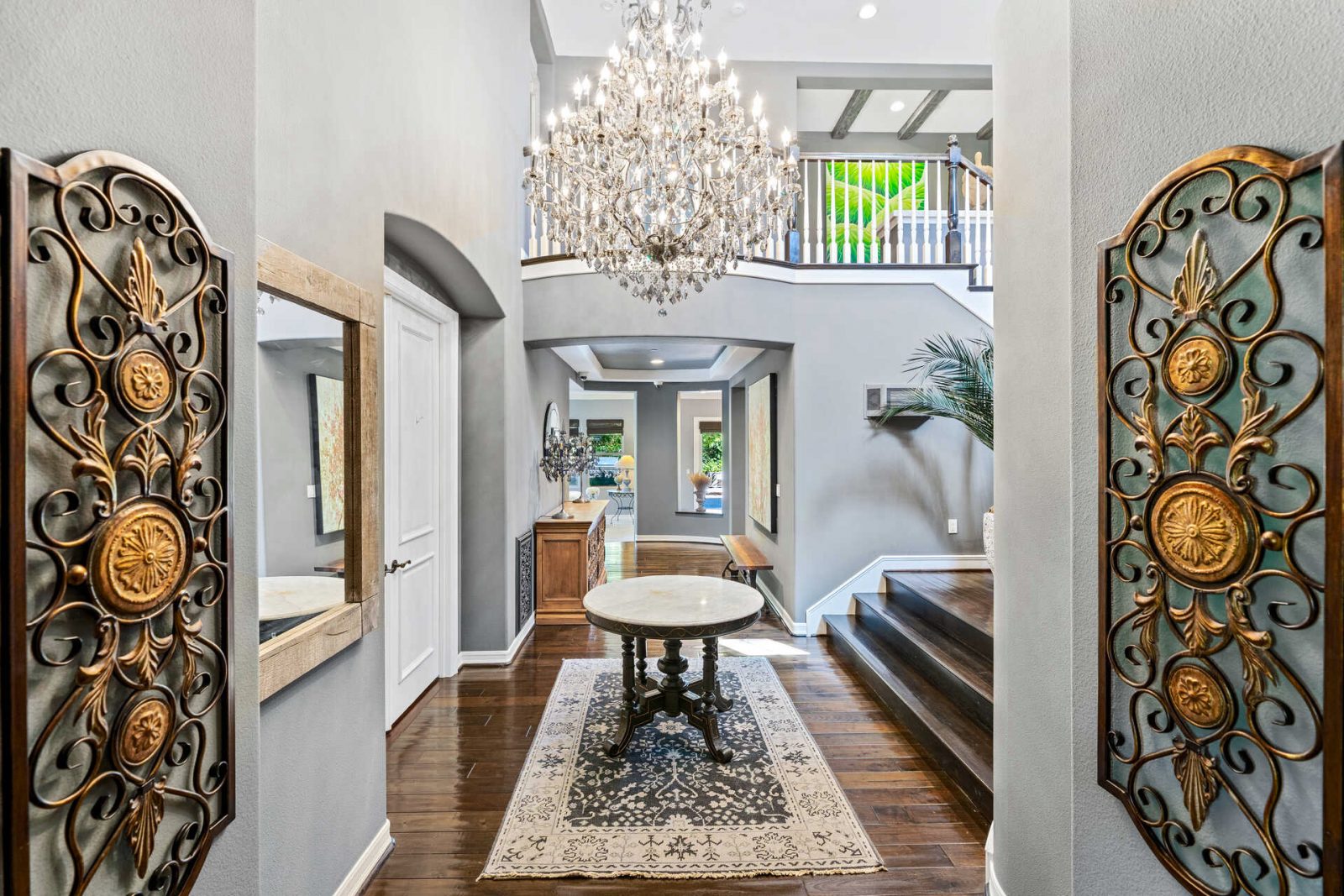 Room scene with Garrison Exotics Black Walnut engineered hardwood flooring in a dark, richly grained Acacia finish