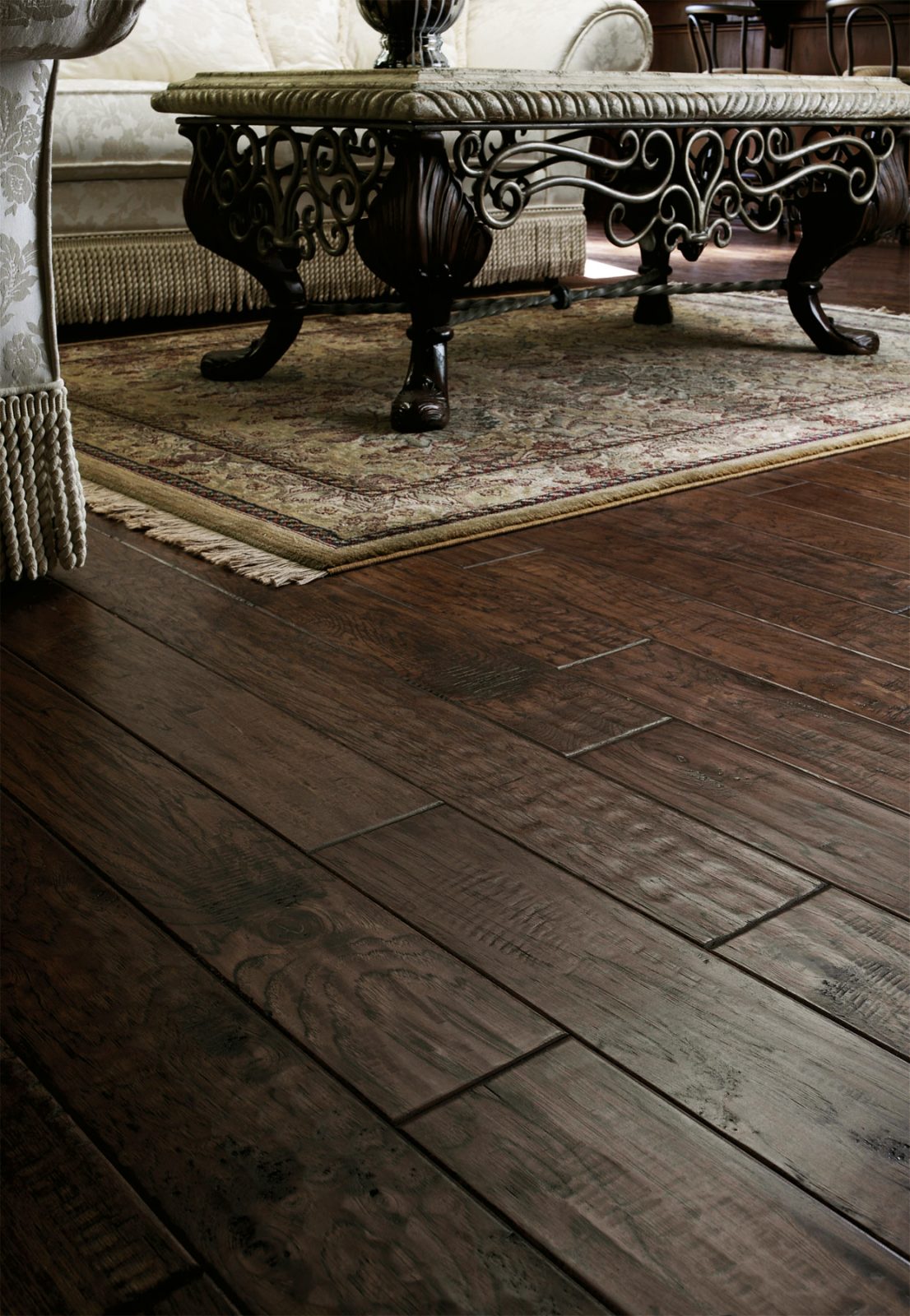 Room scene with Garrison Carolina Classic Charlotte dark hickory engineered hardwood flooring in a transitional living space