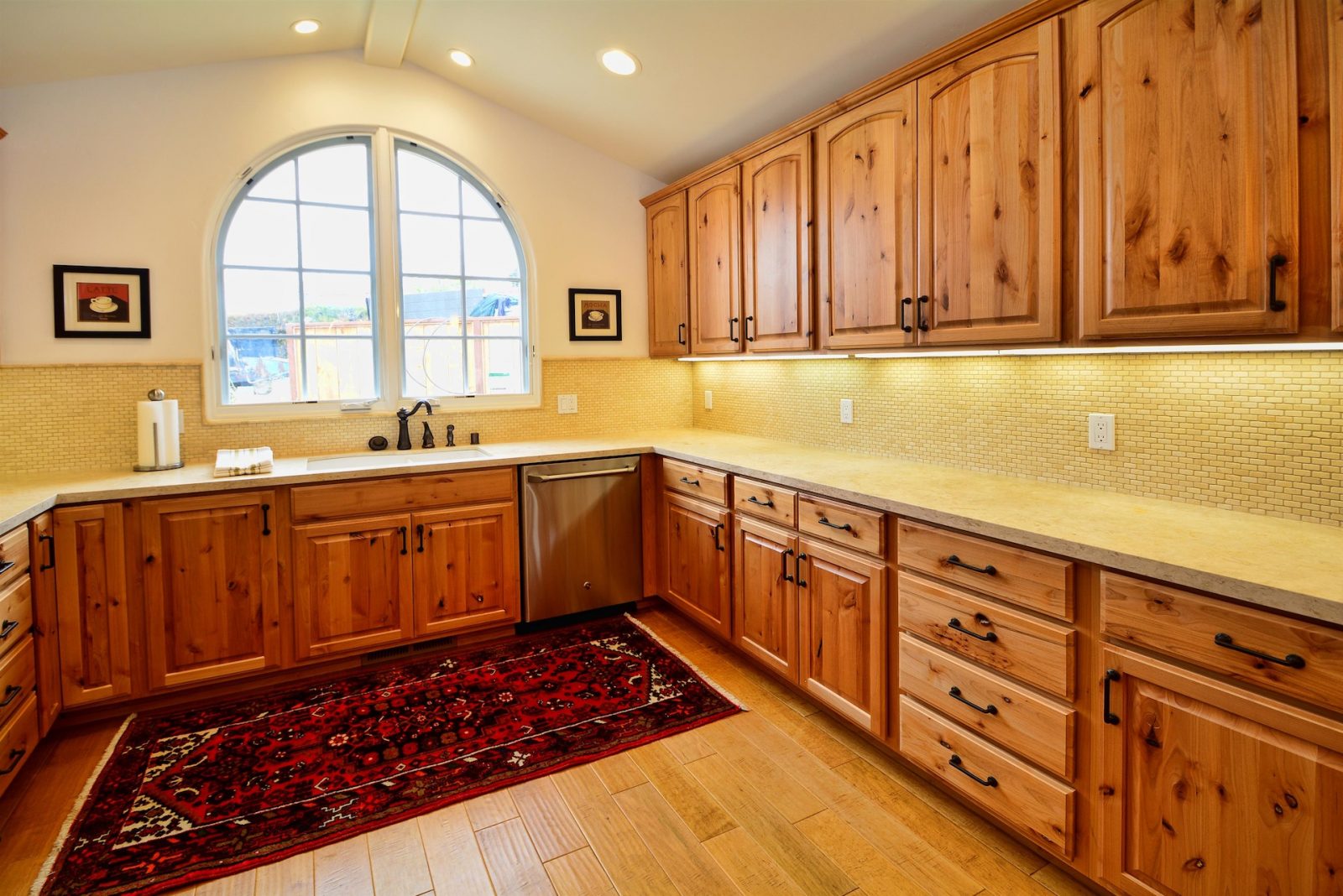 Room scene with Garrison Carolina Classic Durham hand-distressed maple engineered hardwood floor in warm medium tone