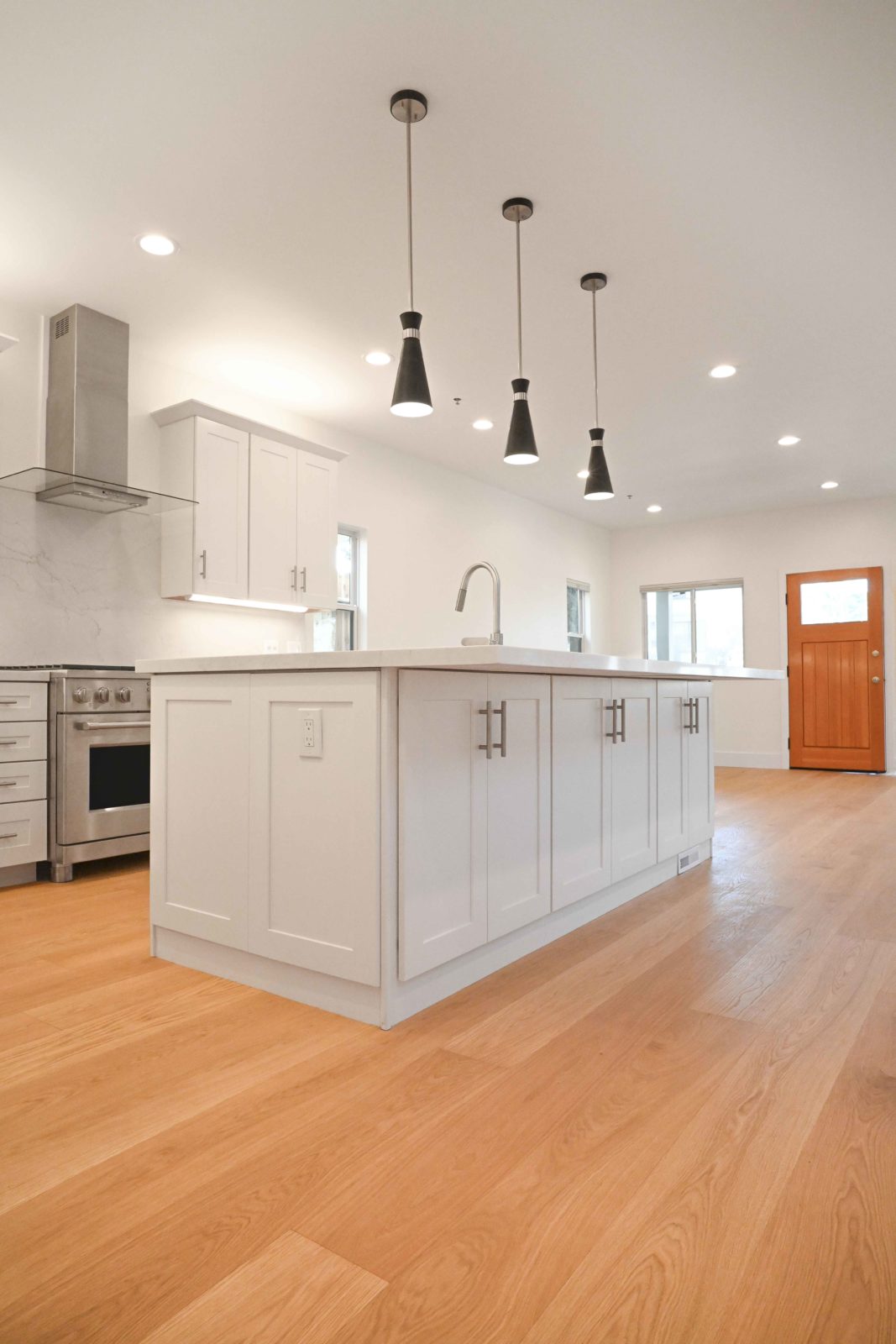 Allora Strada Select European Oak engineered hardwood flooring installed in an open-plan living space.