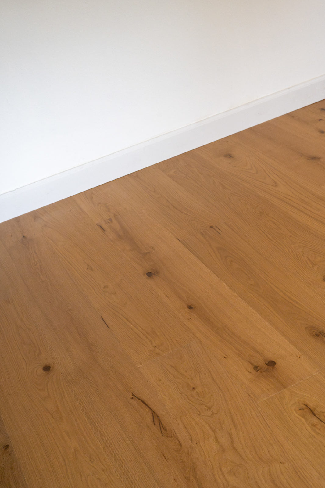 Allora Volto European Oak engineered hardwood flooring installed in an open-concept living space.