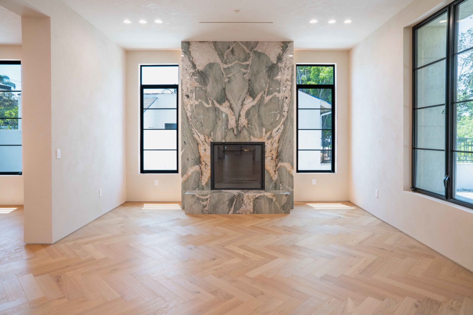 Allora Sella Herringbone European Oak flooring laid in herringbone pattern in a living room setting.