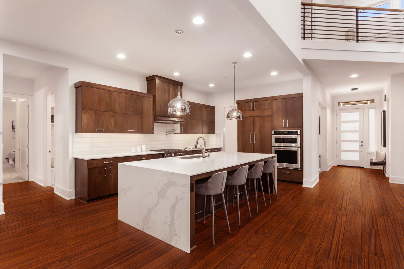 Room scene with Garrison Exotics Sapele engineered hardwood flooring in a warm-toned living space