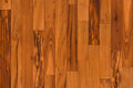 Garrison Exotics Tigerwood 5-inch engineered hardwood plank showing bold grain pattern and warm medium tone.