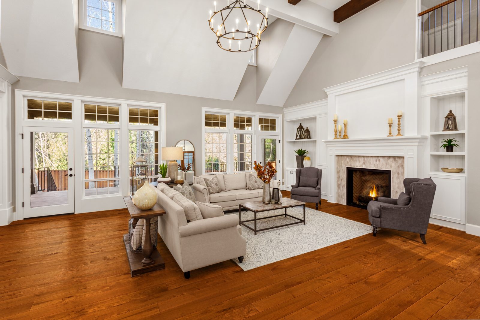 Room scene with Garrison II Smooth Syrup maple engineered hardwood flooring in a warm transitional living space