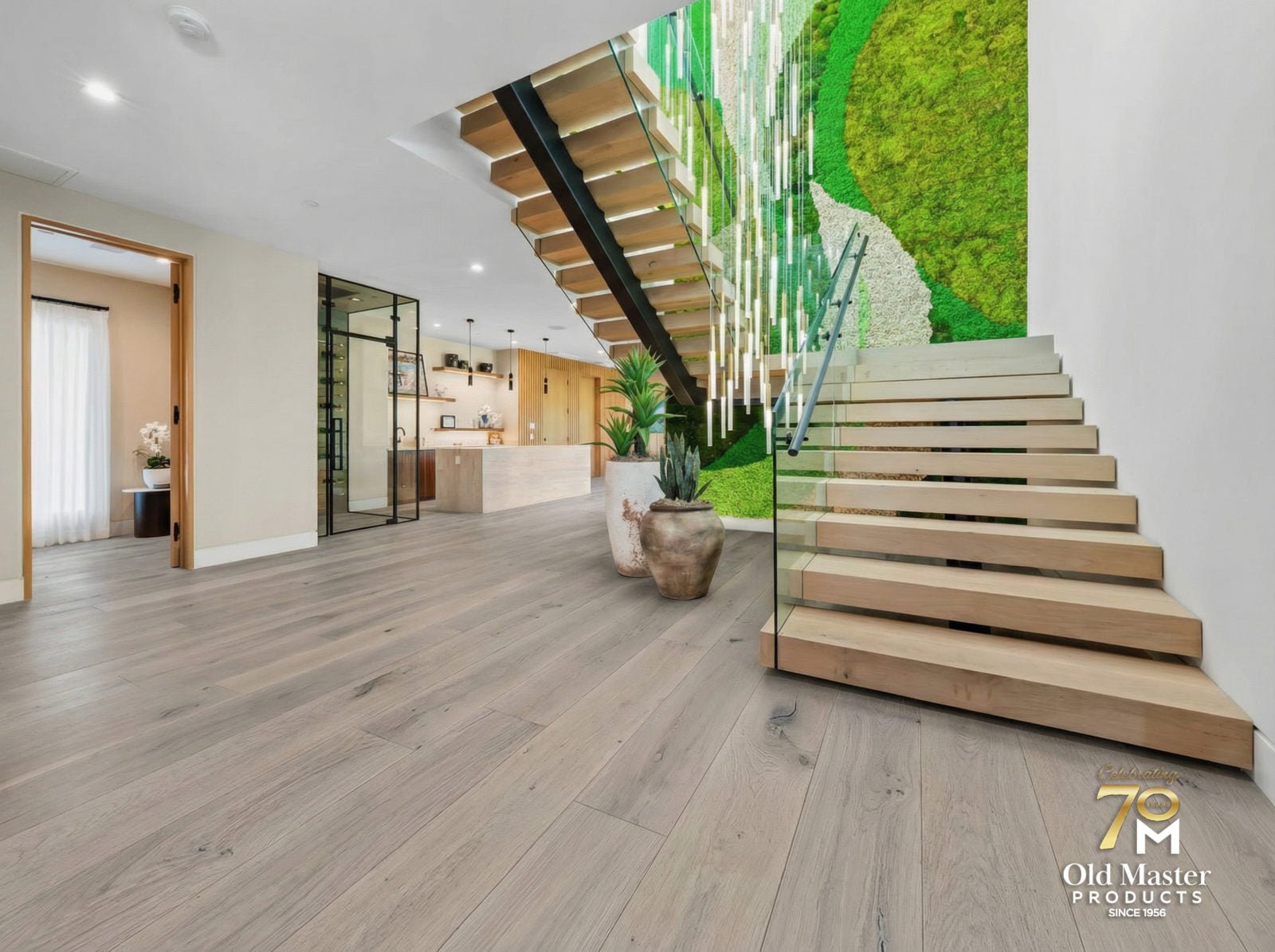 Open-plan living room with Garrison Legends Glenwood wide-plank gray oak engineered hardwood flooring