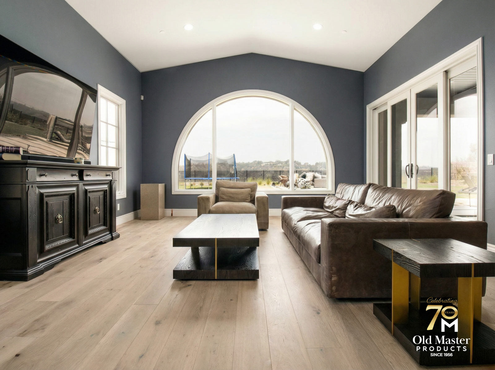 Room scene with Garrison Legends Lugana light oak engineered hardwood flooring in a transitional open-plan living space
