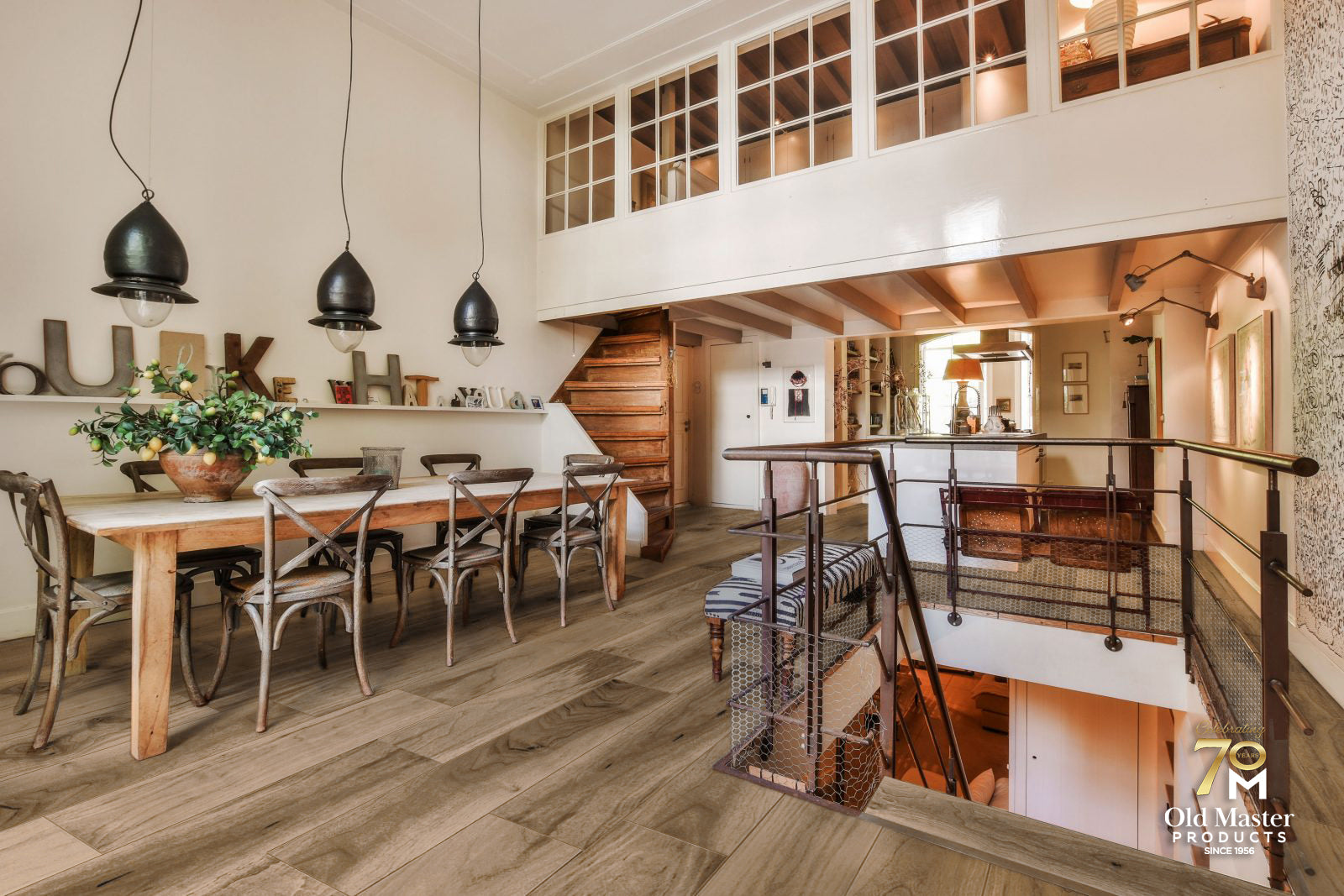 Room scene with Garrison Legends Natural Walnut engineered hardwood flooring in a warm transitional living space