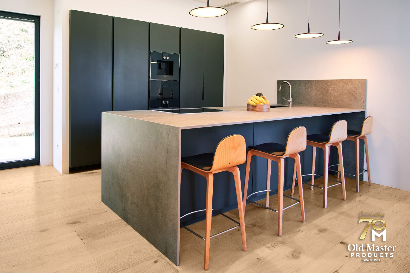 Room scene featuring Garrison Legends Pinot engineered hardwood flooring in warm golden-wheat oak tone in an open living space