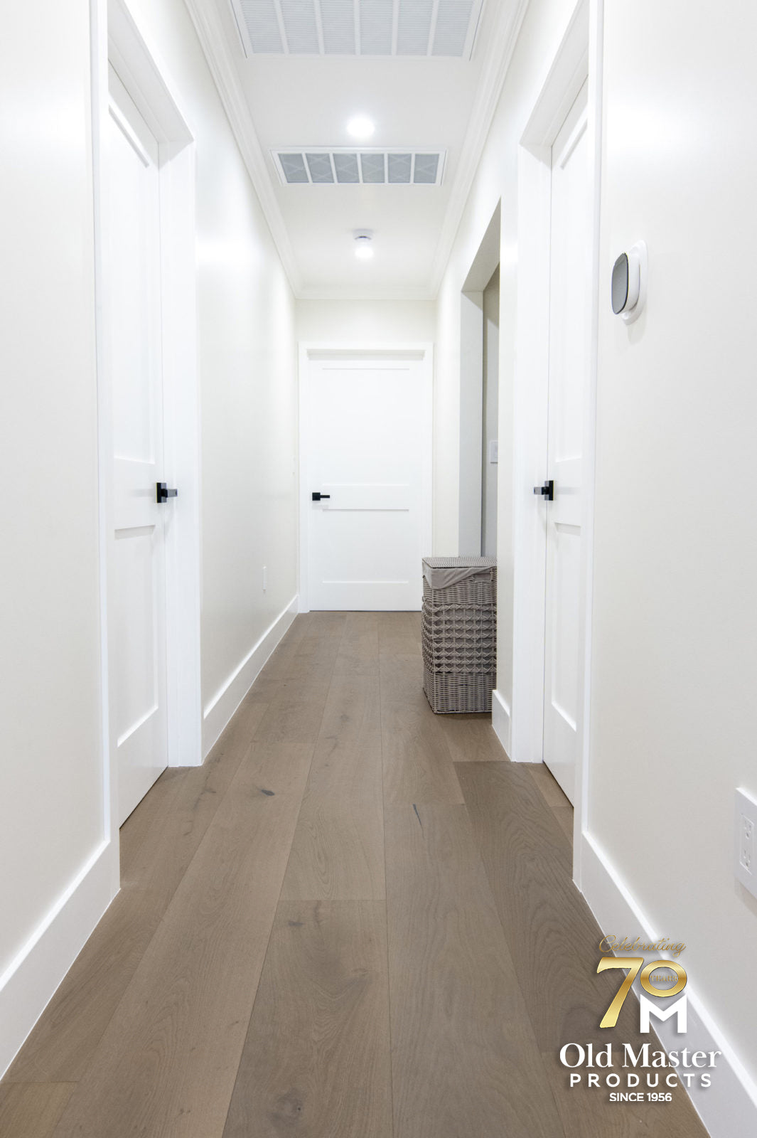 Room scene showing Garrison Legends Verona wide-plank engineered oak floor in a contemporary living space