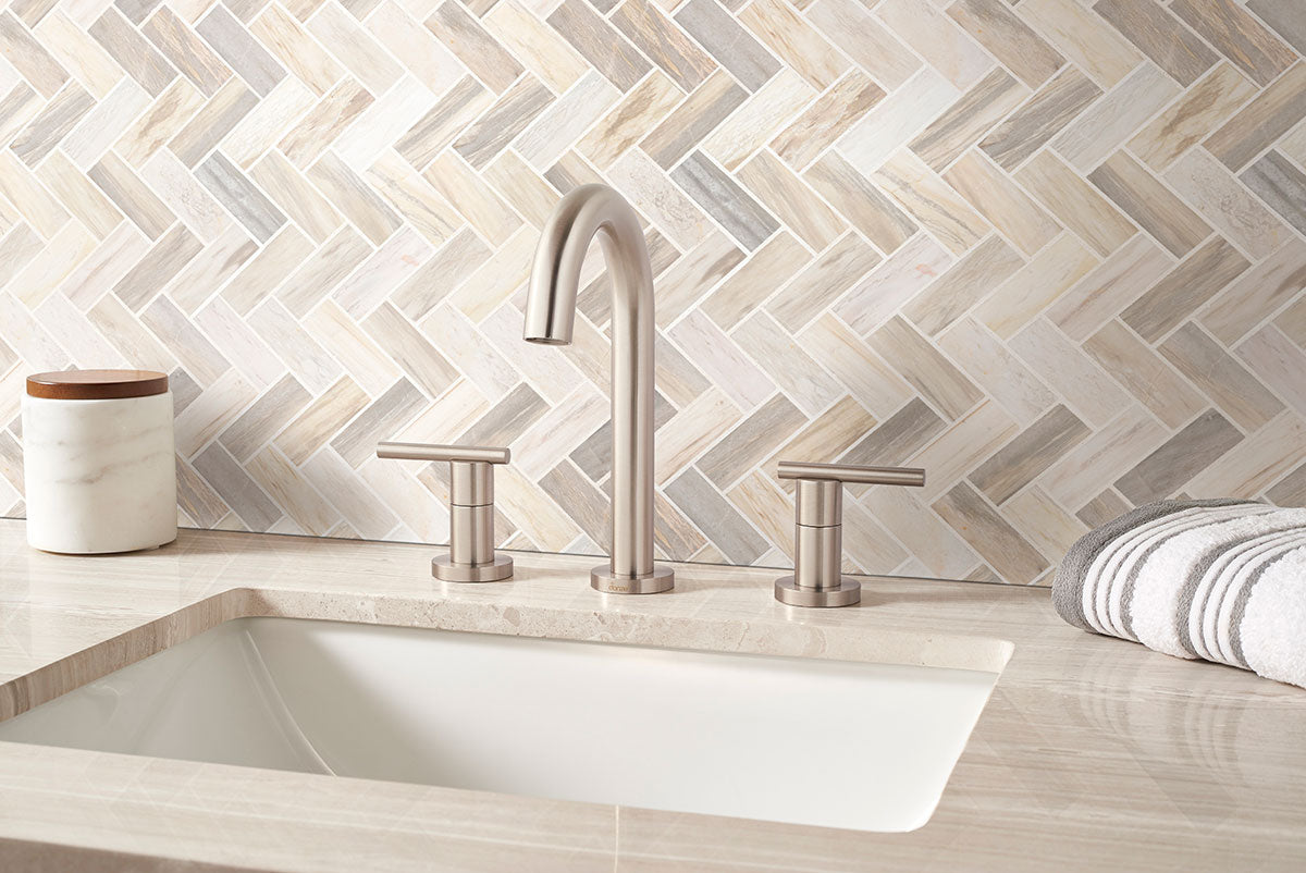 MSI Angora Polished Herringbone Tile — surface detail in natural tonality
