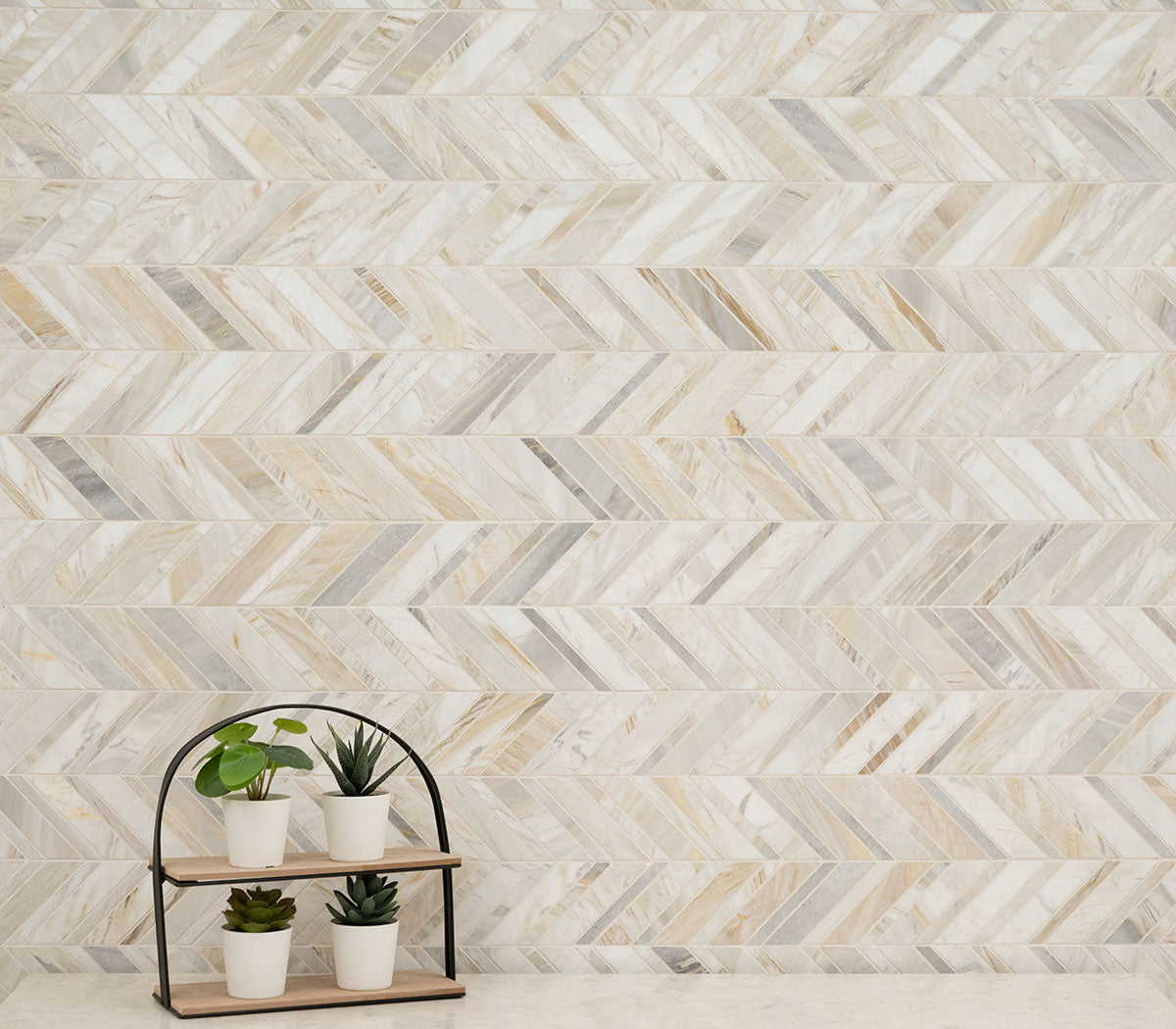 MSI Athena Gold Chevron Pattern Honed — surface detail in gold tonality
