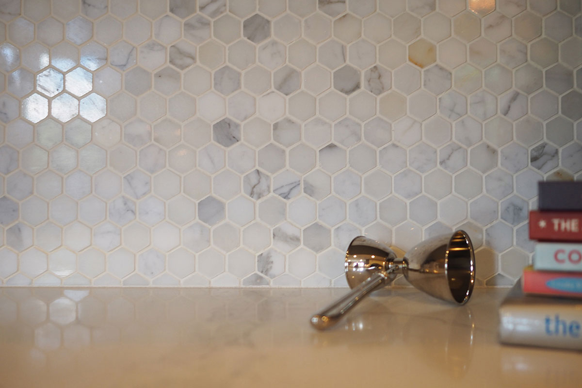 MSI Calacatta Marble Gold 2" Hexagon Mosaic Tile — surface detail in gold tonality
