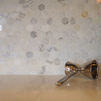 MSI Calacatta Marble Gold 2" Hexagon Mosaic Tile — surface detail in gold tonality