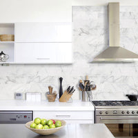 MSI Calacatta Cressa Marble Subway Tile 4x12 — surface detail in natural tonality