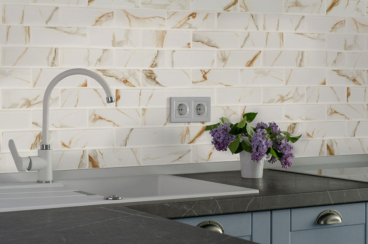 MSI Calacatta Gold Matte 2x6 Subway Tile — surface detail in gold tonality
