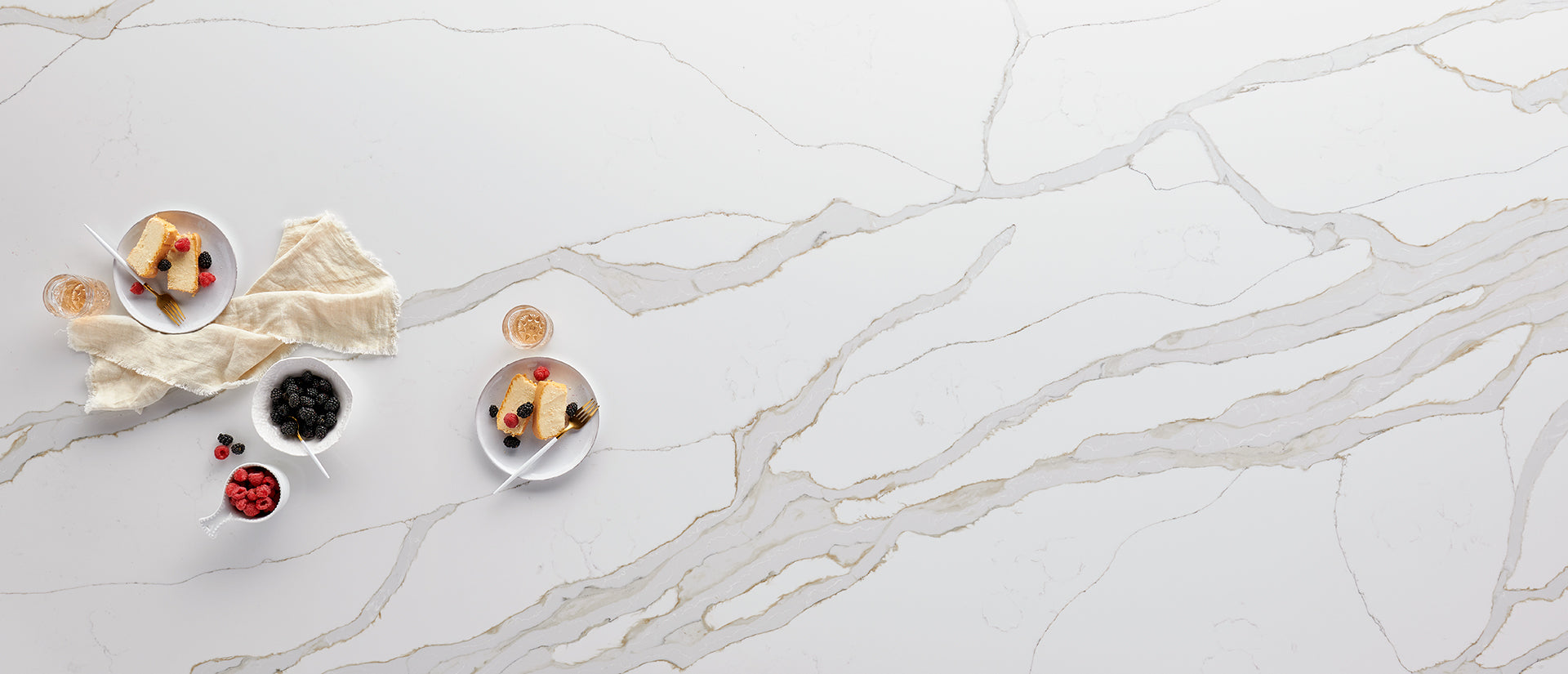 MSI Calacatta Solessio — surface detail in natural tonality engineered slab for kitchen and feature install