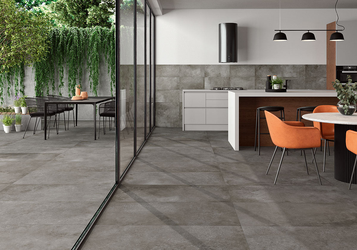 MSI Calypso Graphite — surface detail in graphite tonality through-bodied porcelain for full-room install