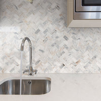 MSI Capri Blue 1x2 Herringbone Honed — surface detail in blue tonality