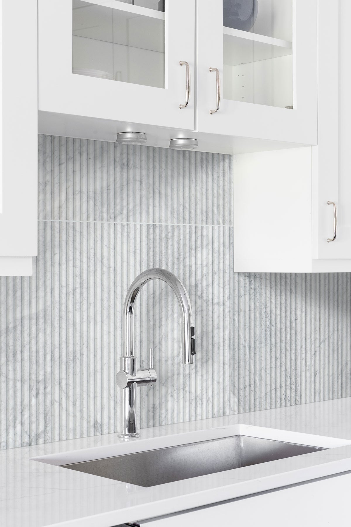 MSI Carrara White Milano Ribbon 12x24 Honed — surface detail in white tonality