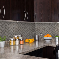 MSI Champagne Bevel Herringbone 8mm — surface detail in champagne tonality