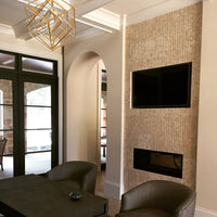 MSI Crema Marfil Arched Herringbone Tile — surface detail in natural tonality