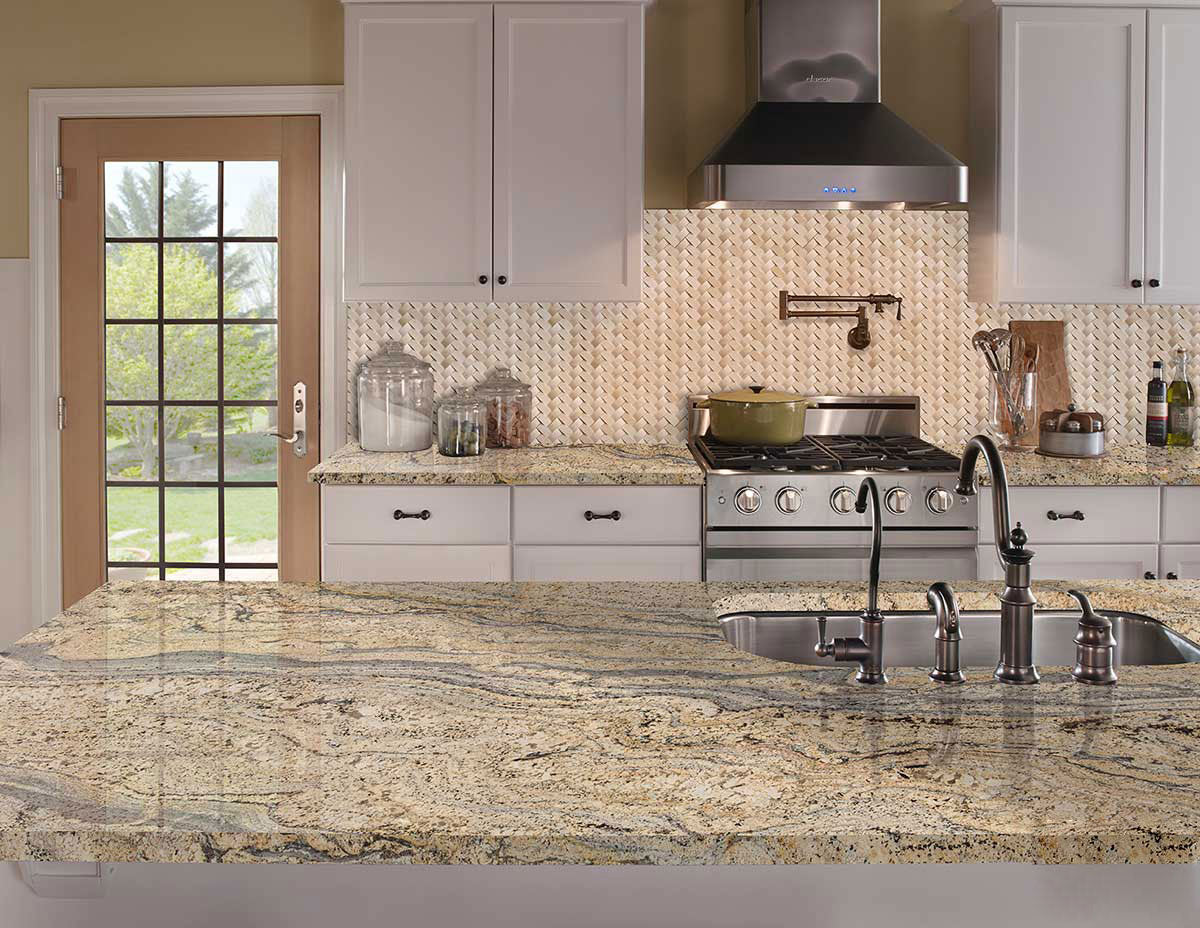 MSI Crema Marfil Arched Herringbone Tile — surface detail in natural tonality