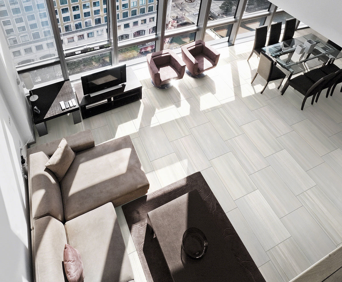 MSI Watercolor Grigio — surface detail in natural tonality through-bodied porcelain for full-room install