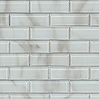 MSI Ivory Amber Beveled Subway Tile — Marble Threshold in ivory tonality