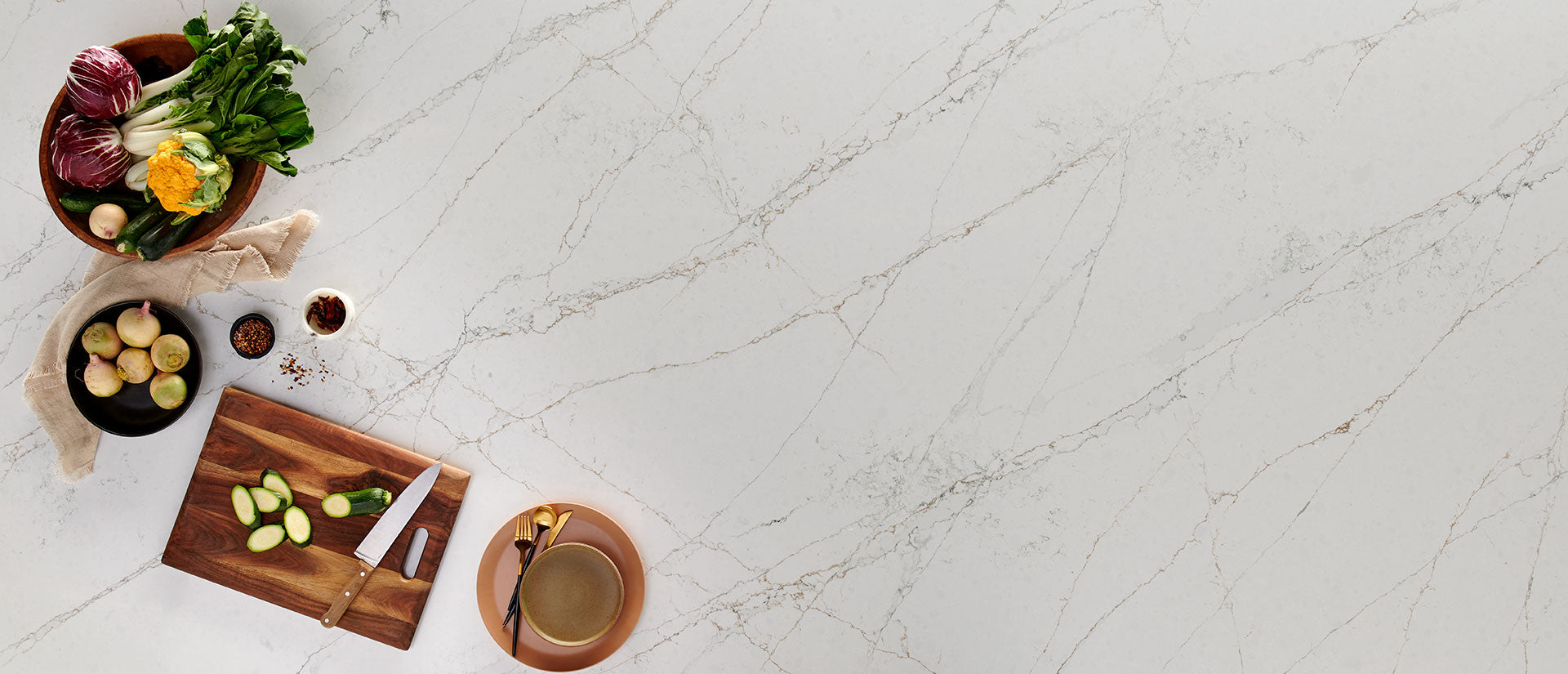 MSI Calacatta Viraldi — surface detail in natural tonality engineered slab for kitchen and feature install