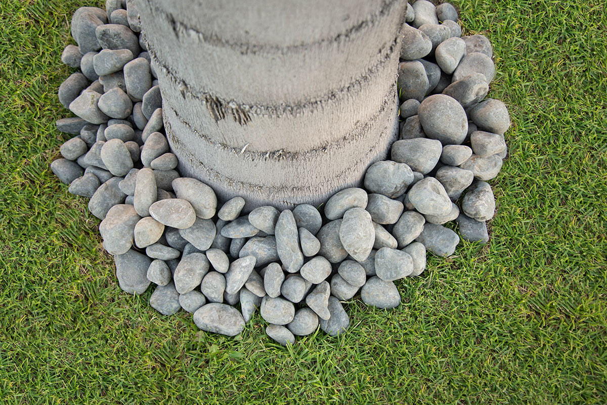MSI Nile Grey Pebbles — surface detail in grey tonality tempered tumbled reflective fire feature fill