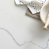 MSI Statuary Classique Quartz — surface detail in natural tonality