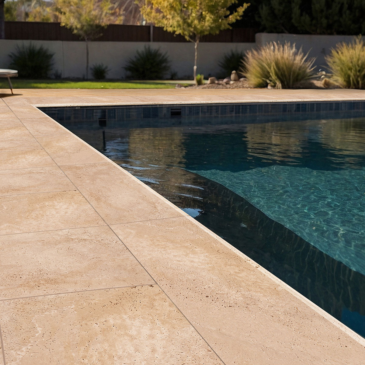 MSI Tuscany Ivory Travertine Paver — surface detail in ivory tonality