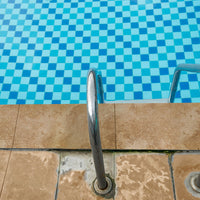 MSI Tuscany Walnut Travertine Coping — surface detail in walnut tonality
