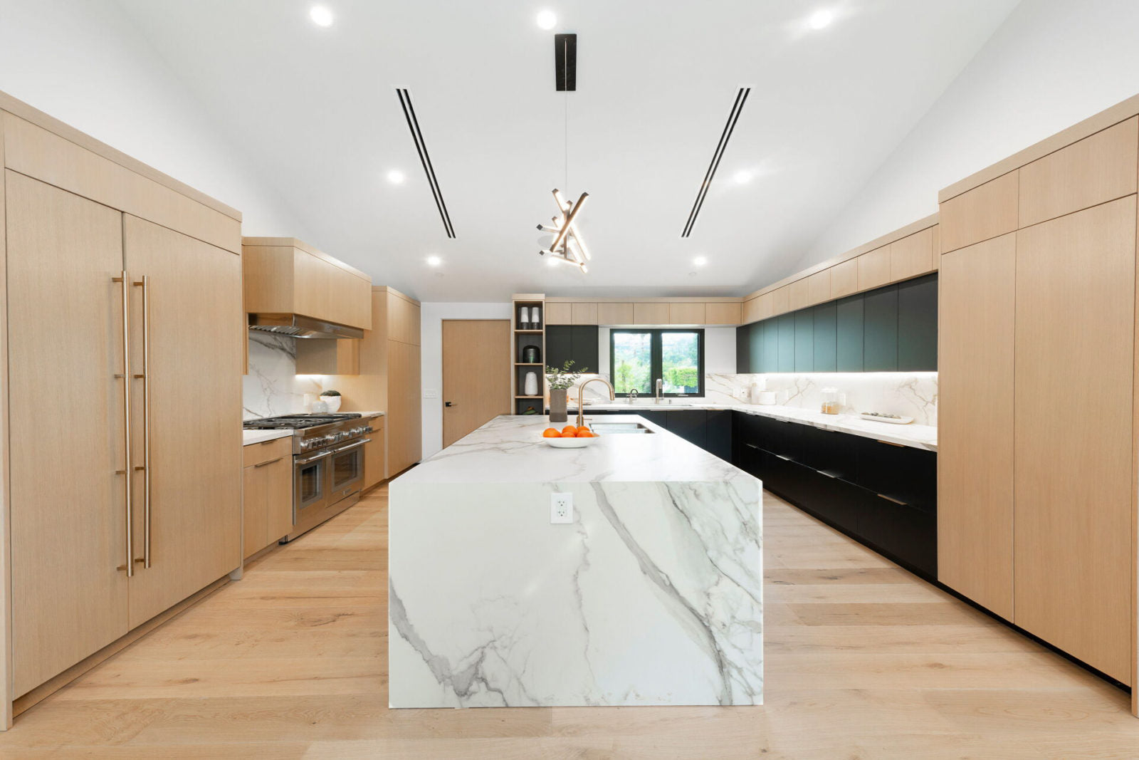 Room scene with Garrison Beverly Hills Rodeo Drive wide-plank European Oak engineered hardwood flooring in light tone