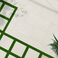 MSI Vortexa Ivory Porcelain Paver — surface detail in ivory tonality