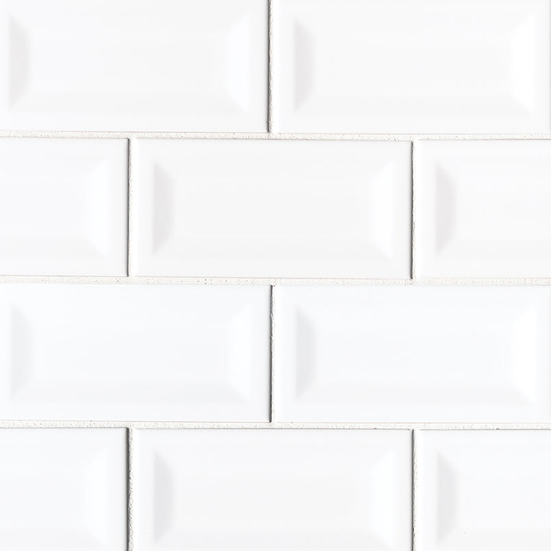 MSI Domino White Glossy Inverted Beveled Subway Tile 3x6 — Marble Threshold in white tonality