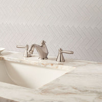 MSI Domino White Herringbone Mosaic Tile — surface detail in white tonality